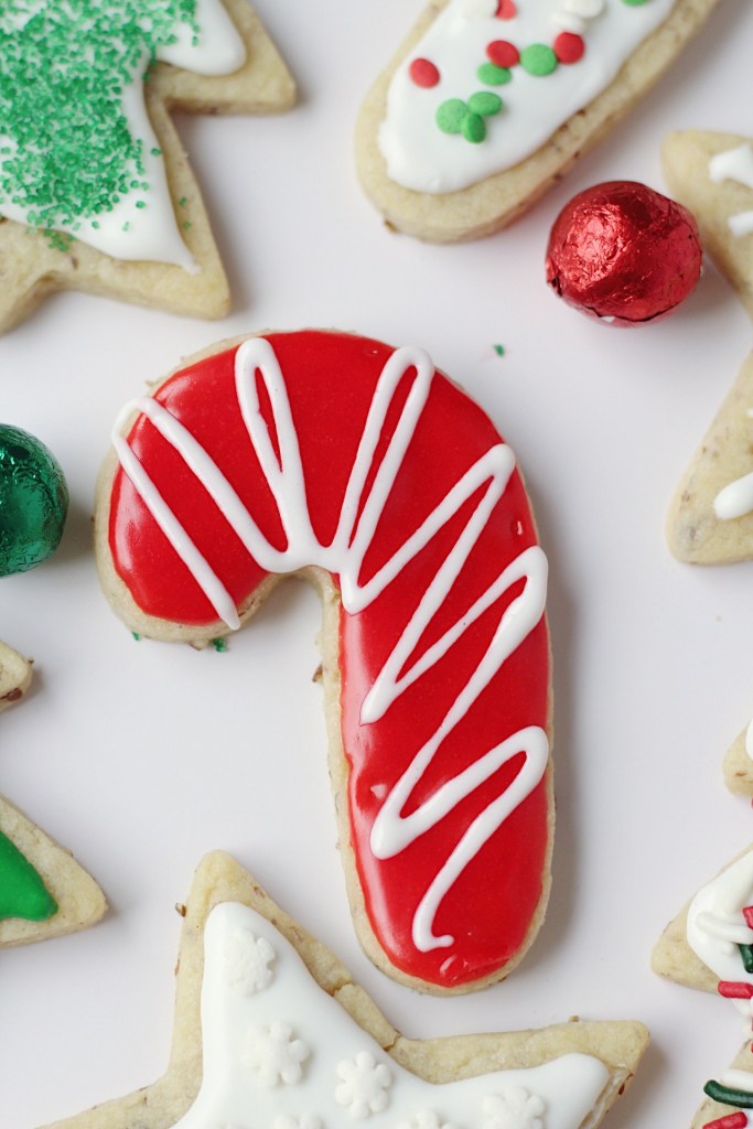close up candy cane vegan cut out sugar cookie decorated
