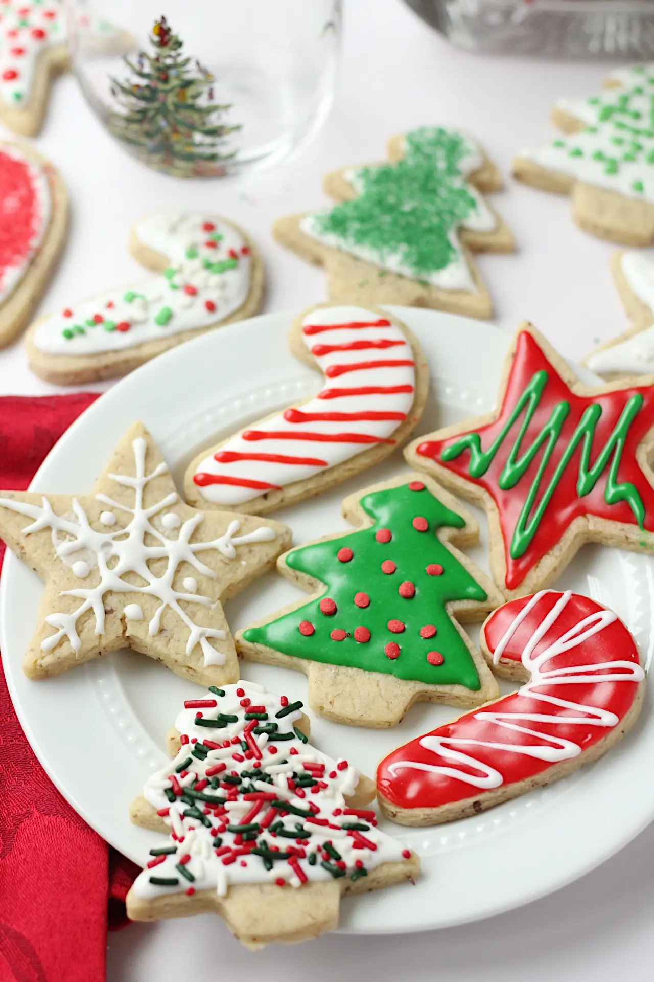 vegan cut out sugar cookies on a white plate