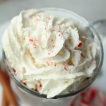 top view of whipped cream with crushed candy canes on homemade hot chocolate