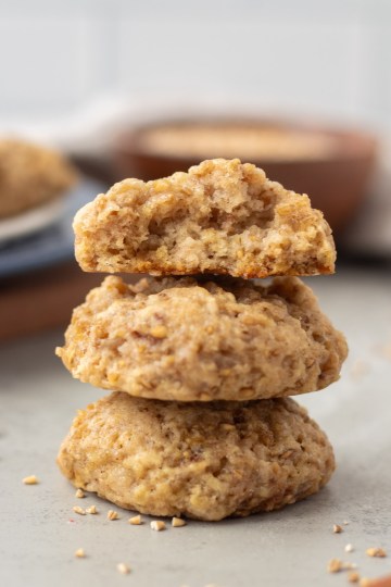 steel cut oatmeal cookies stacked with one showing texture of inside