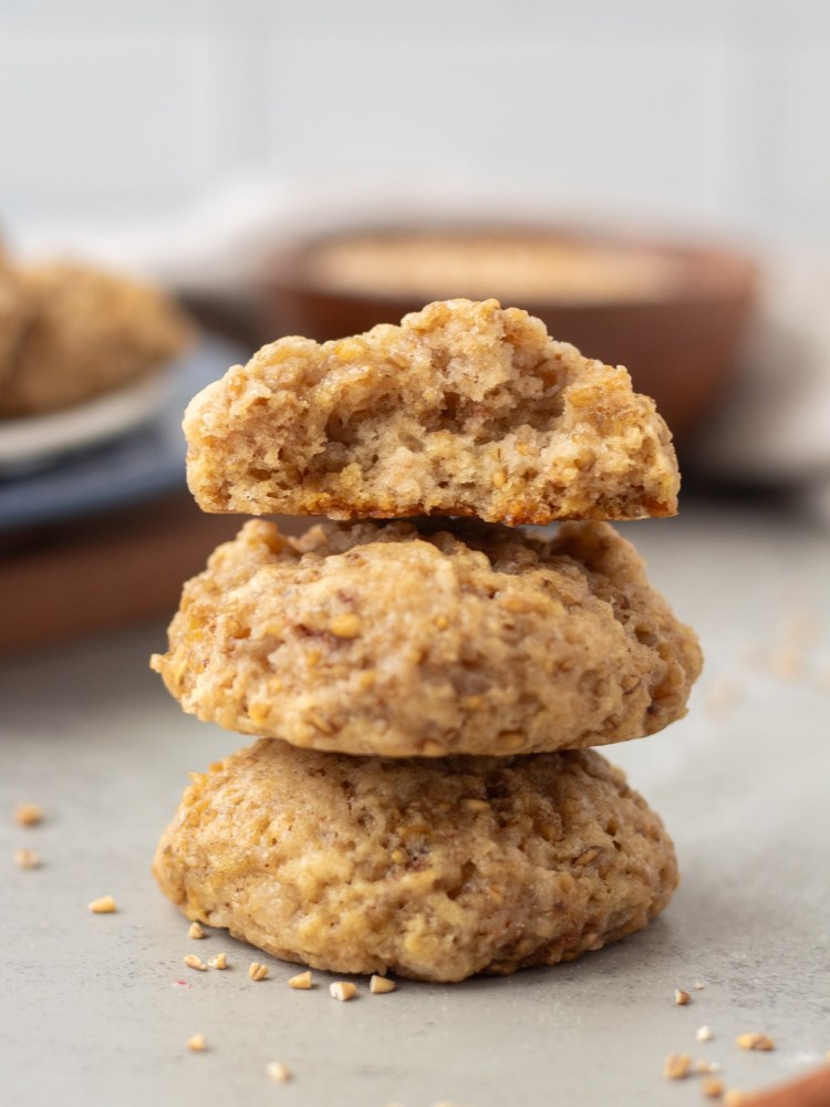 steel cut oatmeal cookies stacked with one showing texture of inside