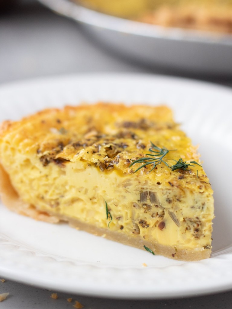 slice of vegan just egg quiche close up