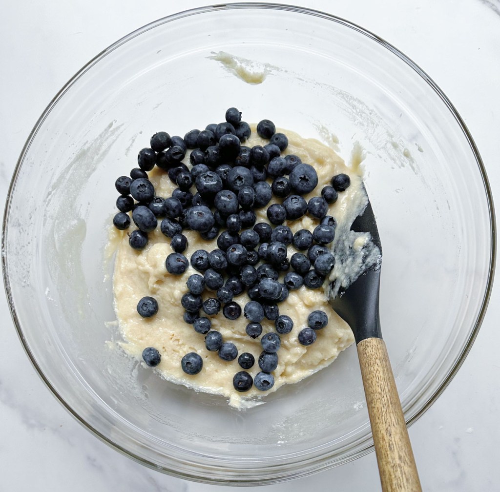 lemon muffin batter with blueberries added before mixing
