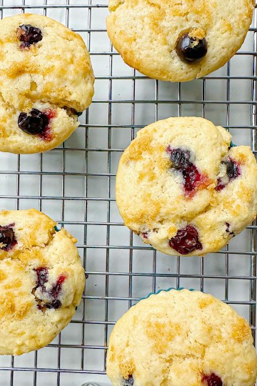 finished vegan lemon blueberry muffins on cooling rack