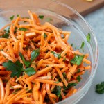 close up Moroccan Carrot Salad in glass bowl