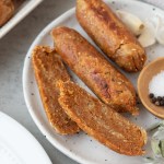 finished vegan breakfast sausage links cut open to show texture