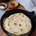 flour tortillas in a cast iron skillet