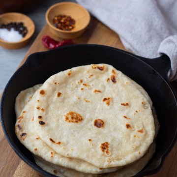 flour tortillas in a cast iron skillet
