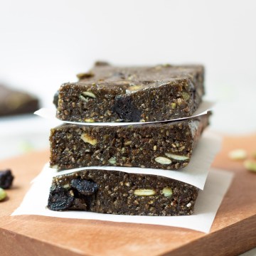 nut free protein bars stacked with parchment paper
