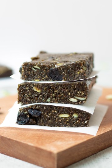 nut free protein bars stacked with parchment paper
