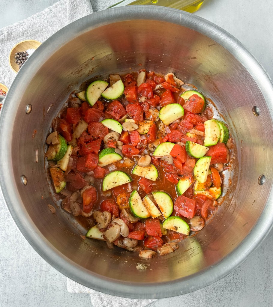 sauteed veggies with spices in a large pot
