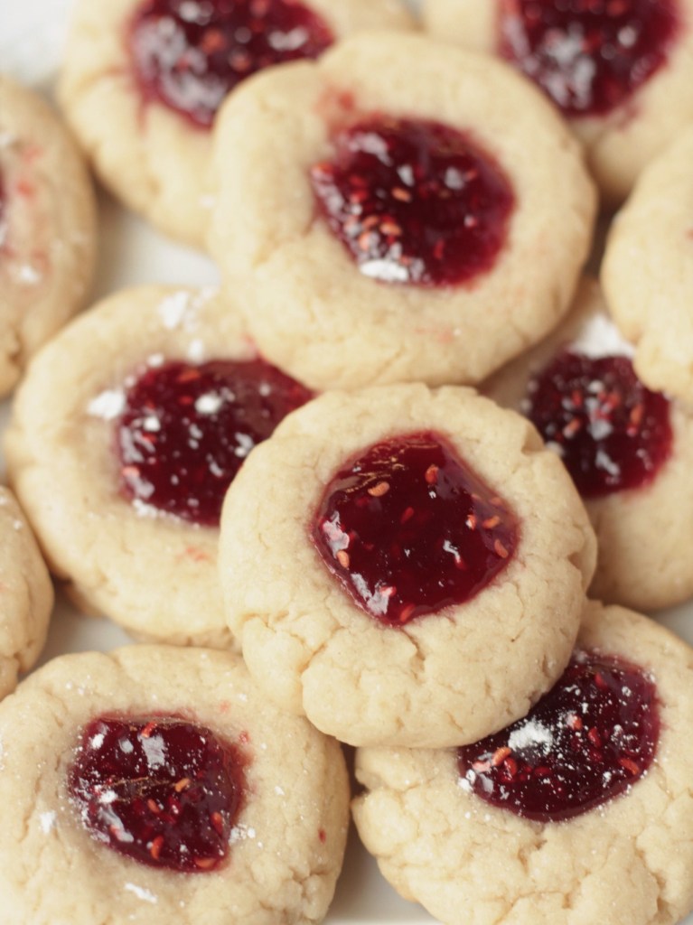 close up view raspberry thumbprint cookies