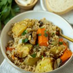 finished bowl of instant pot vegetable casserole in a bowl with fork
