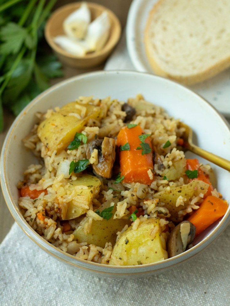 finished bowl of instant pot vegetable casserole in a bowl with fork